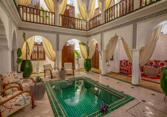 Is it better to stay in a riad or hotel